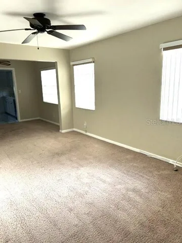 Living room looking toward dining area & kitchen.