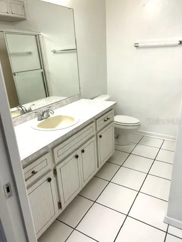 Hall bathroom has tub and linen closet