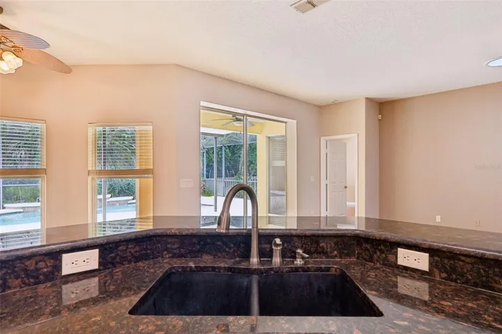 With a spacious OPEN-CONCEPT living area, the Kitchen and Family Room flow seamlessly together.