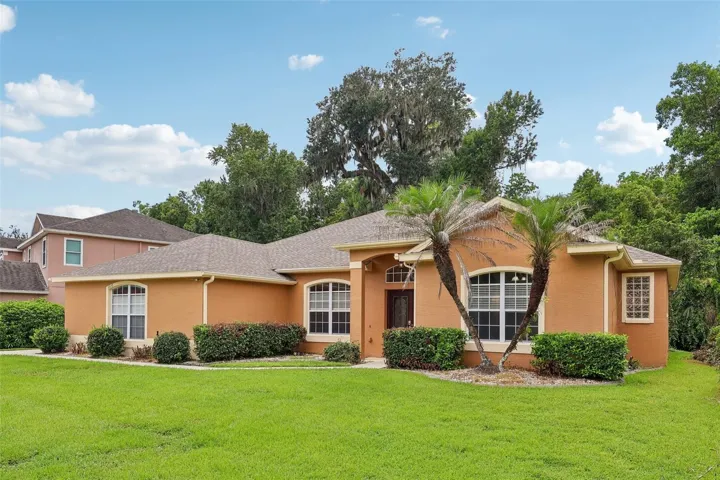 Experience elegance, comfort, and privacy in this STUNNING 4-bedroom, 2.5-bath pool home nestled on A THIRD OF AN ACRE in the highly desirable Winding Hollow community of Winter Springs.