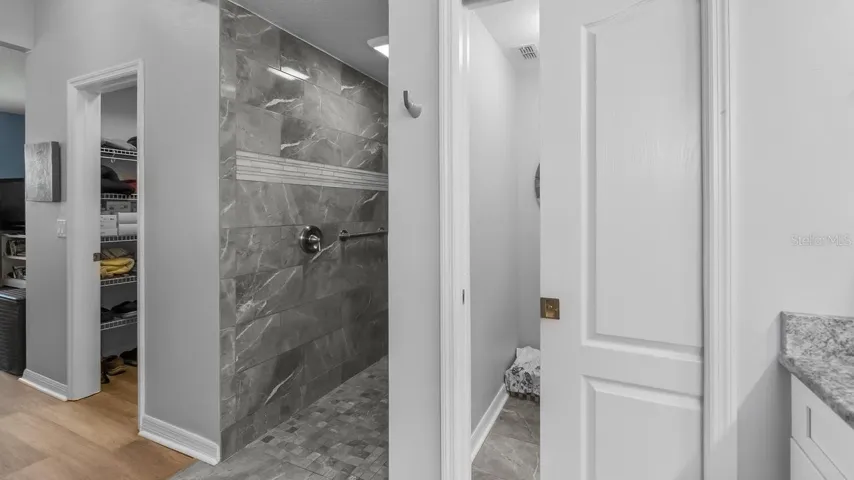 Walk in shower and water closet