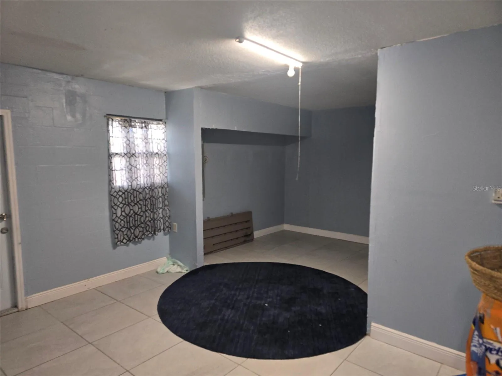 GARAGE CONVERTED TO GAME ROOM WITH SEPARATE ENTRANCE