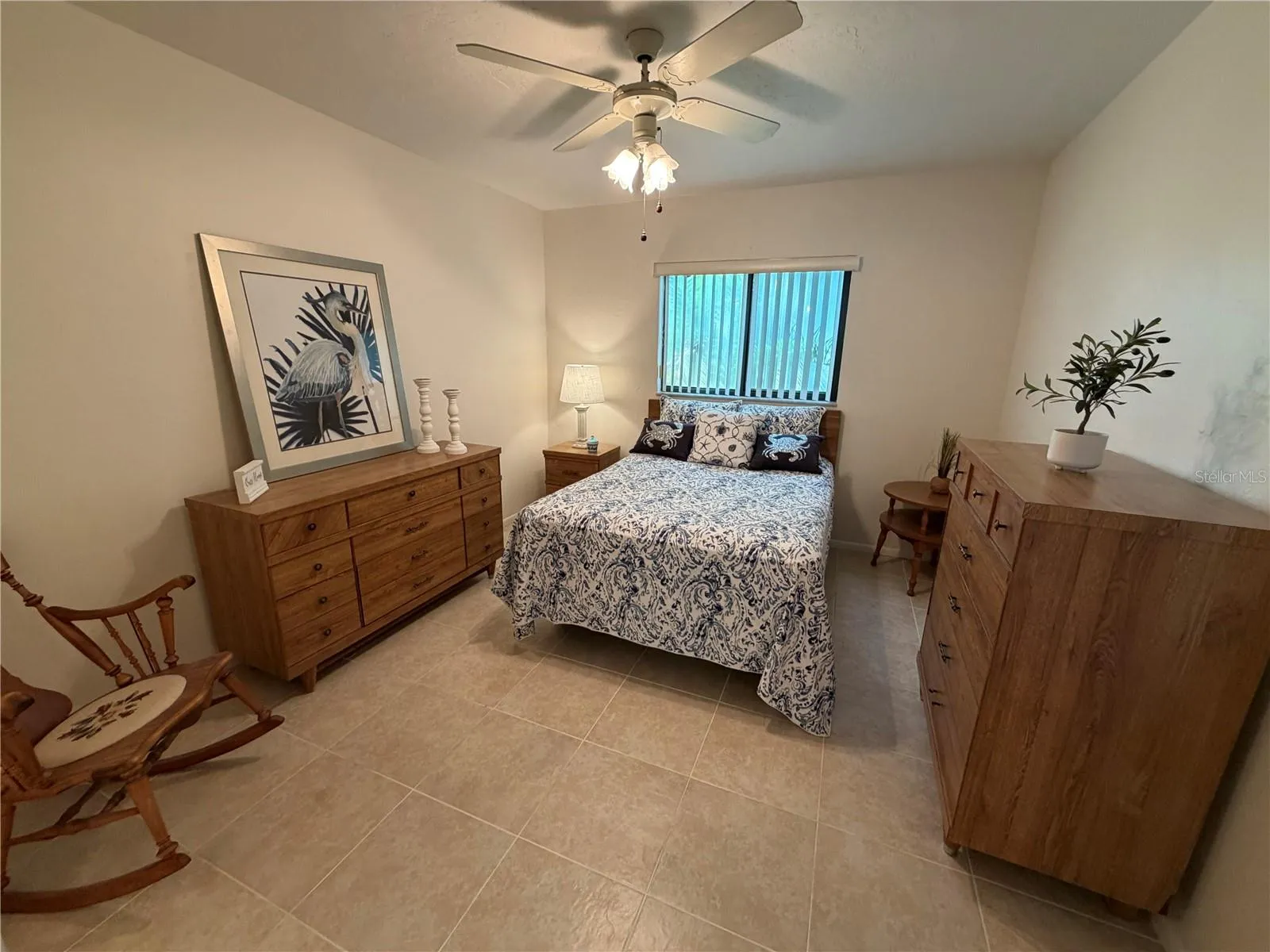 Primary Bedroom with En Suite, Walk-In Closet, Tile Flooring, Ceiling Fan