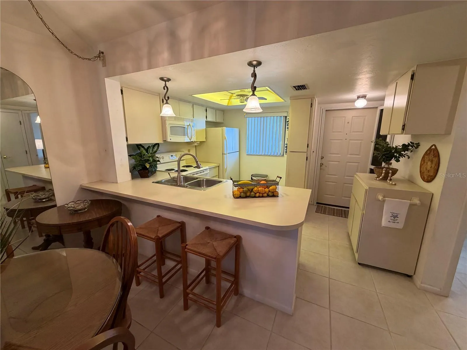 Breakfast Bar to Kitchen - All Tile Flooring