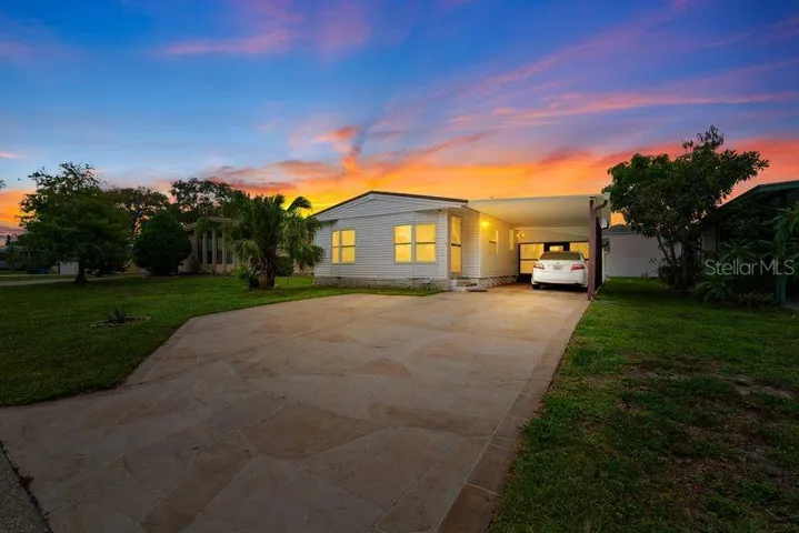 Front of home at night.