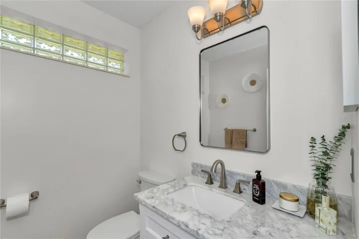 Half bath - matching finishes to other two baths