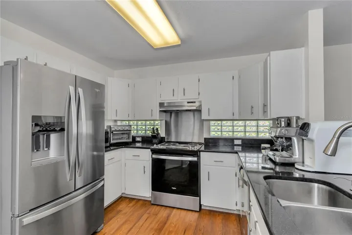 Updated kitchen, upgraded appliances, granite counter tops.