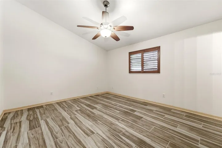 Bedroom three with comfortable secondary bedroom with generous natural light.
