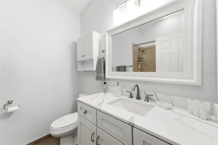 Recently updated with quartz countertops, modern fixtures, and timeless finishes.