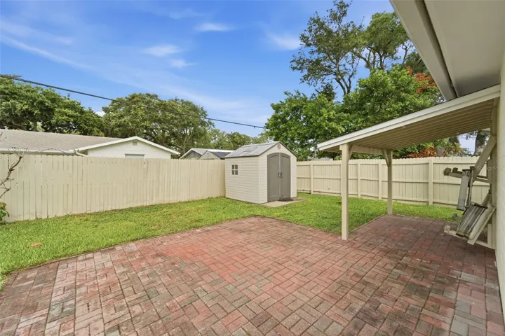 Enjoy your morning coffee or evening gatherings under the covered patio.