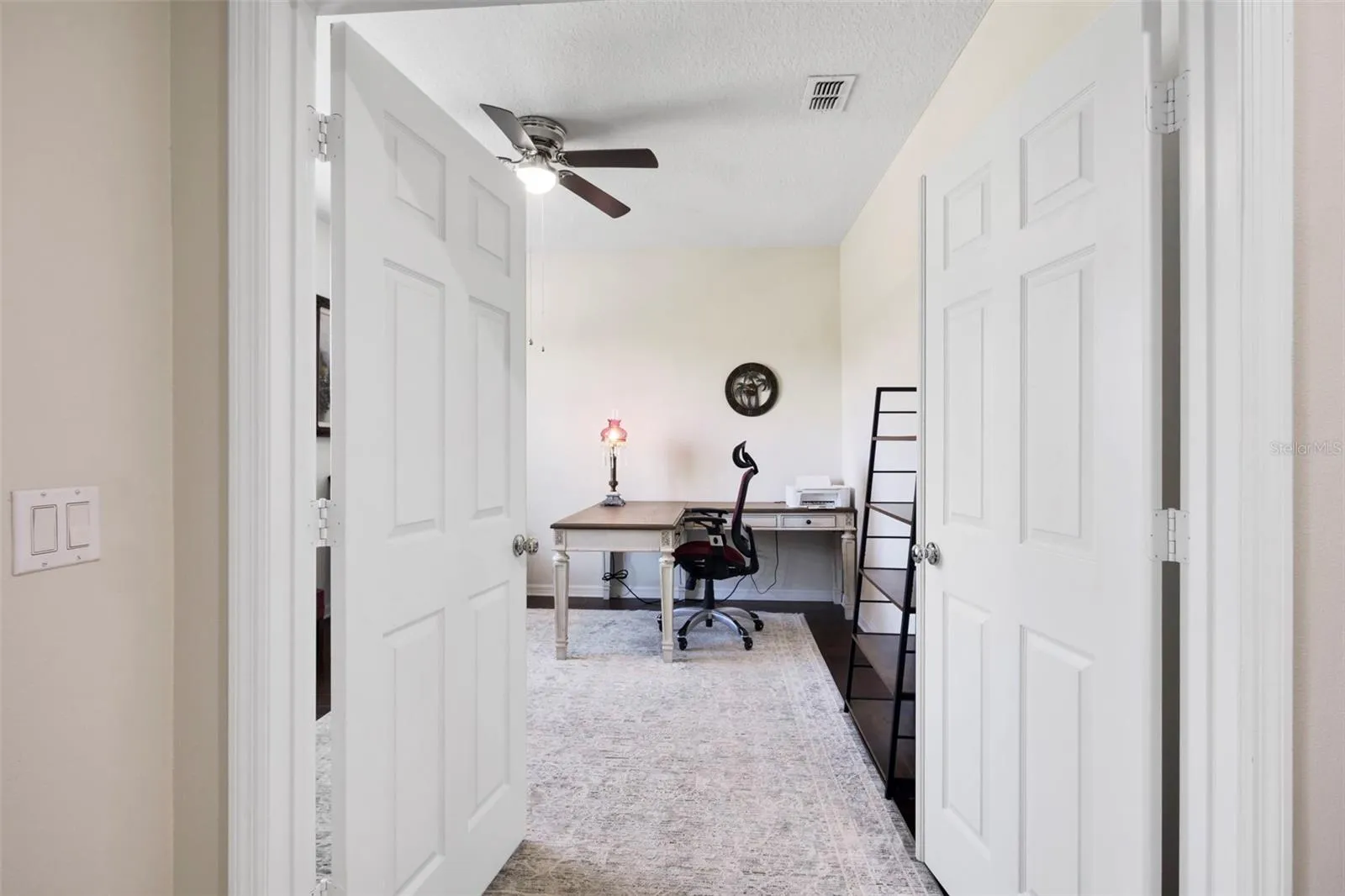 TO YOUR LEFT WILL BE THE OFFICE/BEDROOM