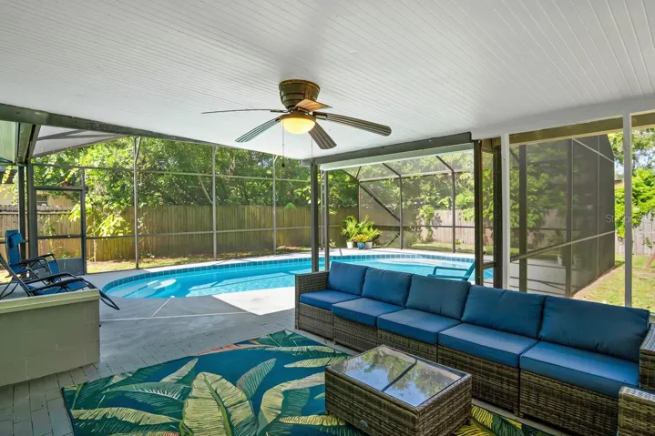 A great feature of this home is having the screened in pool and back yard.