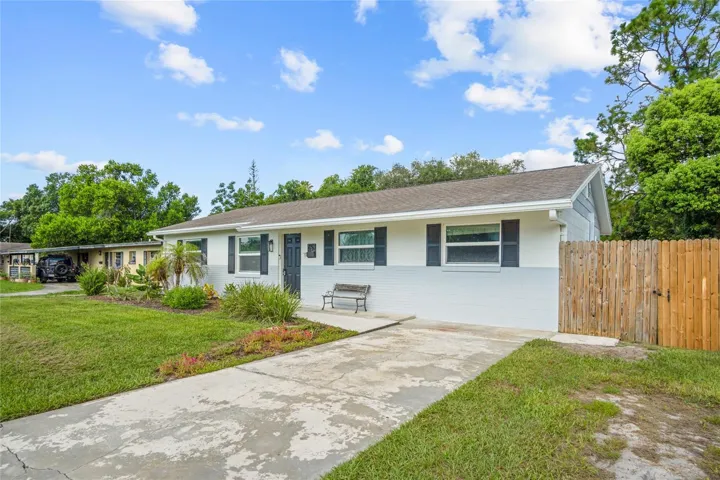 Features include:  gas range and hot water, tile floors, ceiling fans, double pane windows, inside utility room, and a swimming pool.