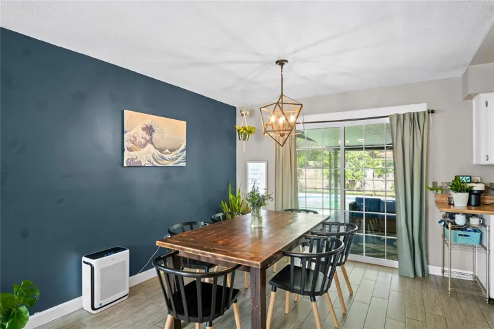 A view of the dining room looking out to the pool.