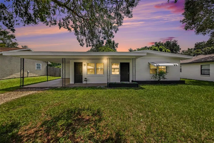 Beautifully updated Winter Park home with standout curb appeal, featuring a new roof, fresh exterior paint, dual-pane energy-efficient windows, built-in front planters, and a welcoming front walkway that creates an inviting first impression with NO HOA!!