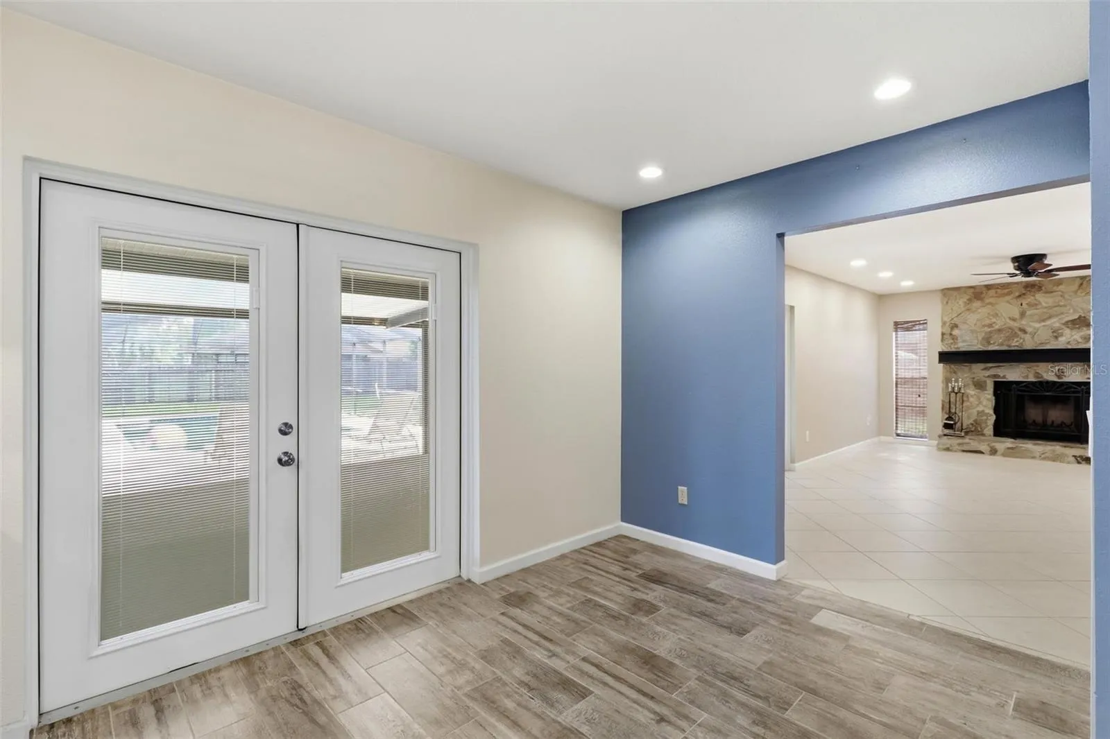 Breakfast nook with doors to pool and lanai