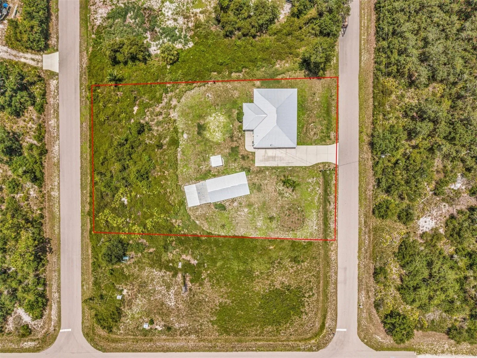 Home is situated on 4 lots totaling just under 1 acre of land!