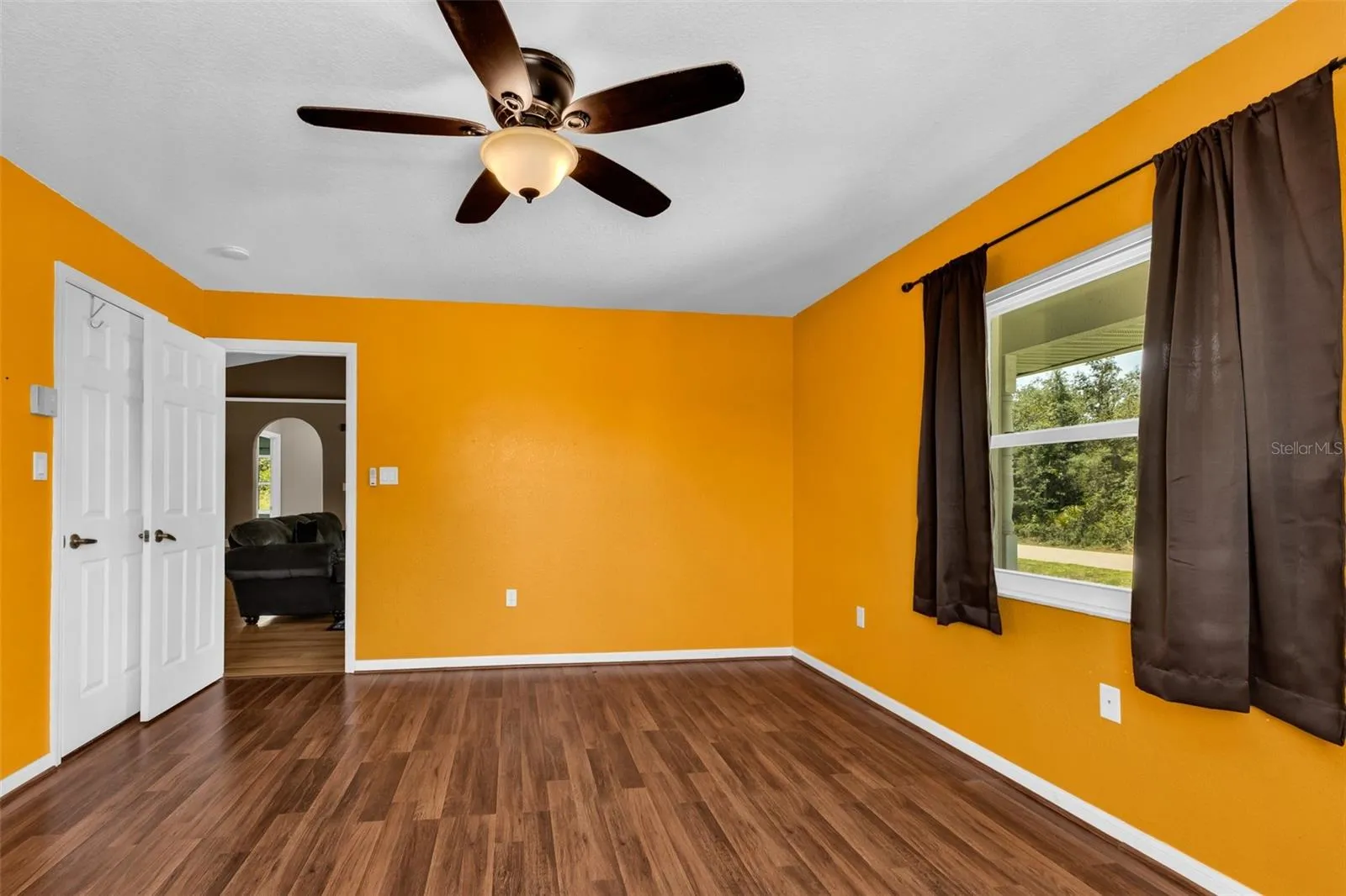 Primary bedroom with walk in closet