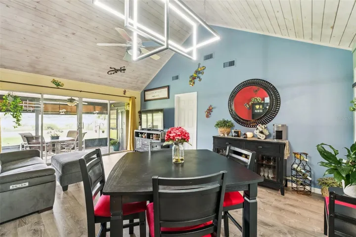 Dining room area. Dining room table and chairs will stay as well as coffee bar.