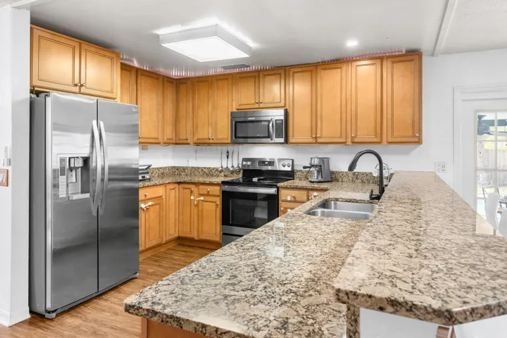 Main house kitchen with granite counters