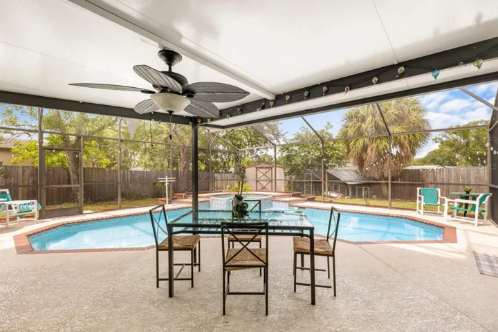 Sparkling pool with back patio