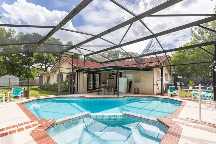Sparkling pool and back patio