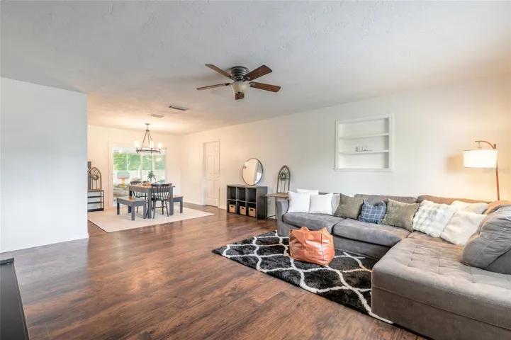Living opens to dining room, Off the dining room is the kitchen to the left and the office/flex room to the right - off the office you can access the garage.