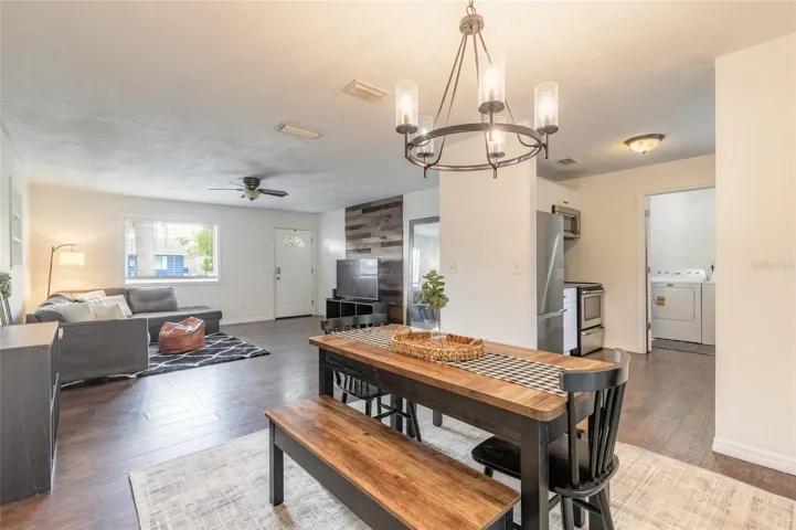 dining room opens to kitchen and living