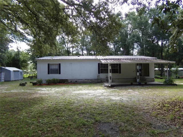 Front of Home with Carport