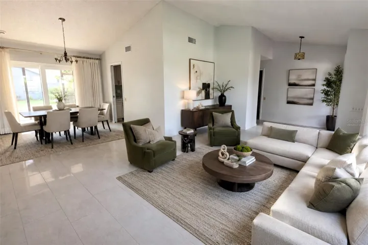 virtually staged - Living Room / Dining Room with gorgeous Porcelain Tile