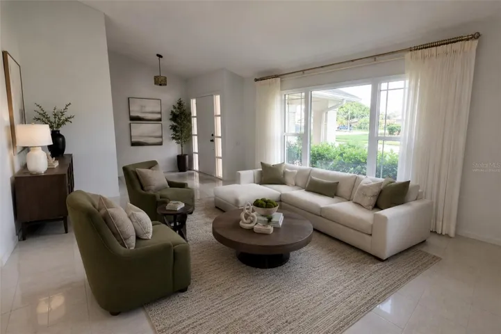virtually staged - Living Room with gorgeous Porcelain Tile & huge windows