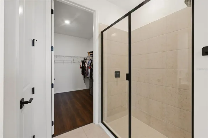 Tiled Shower with Trimmed Shower doors