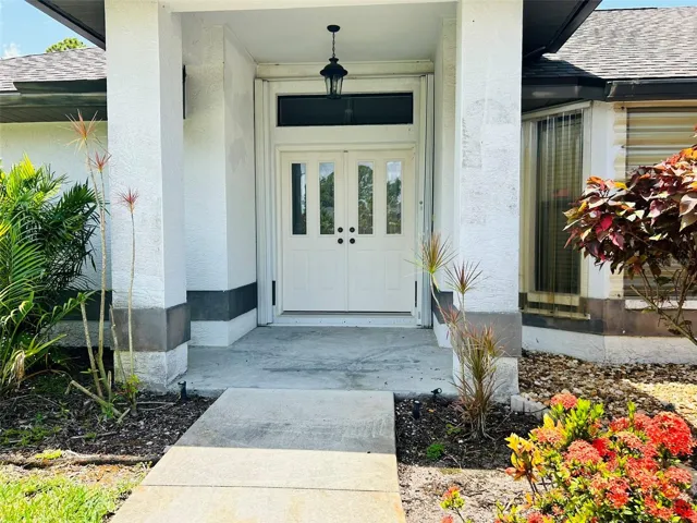 Front door with built in storm shutters