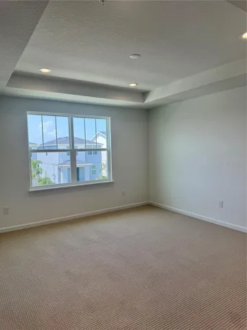 Primary suite with tray ceilings