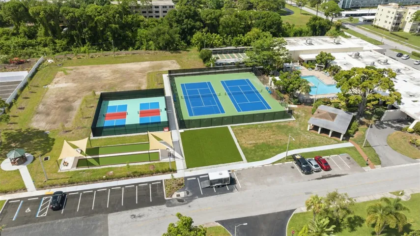 you are close to the main clubhouse, notice these newly renovated amenities, pickleball, tennis courts, bocce ball and shuffleboard and the main pool as well!