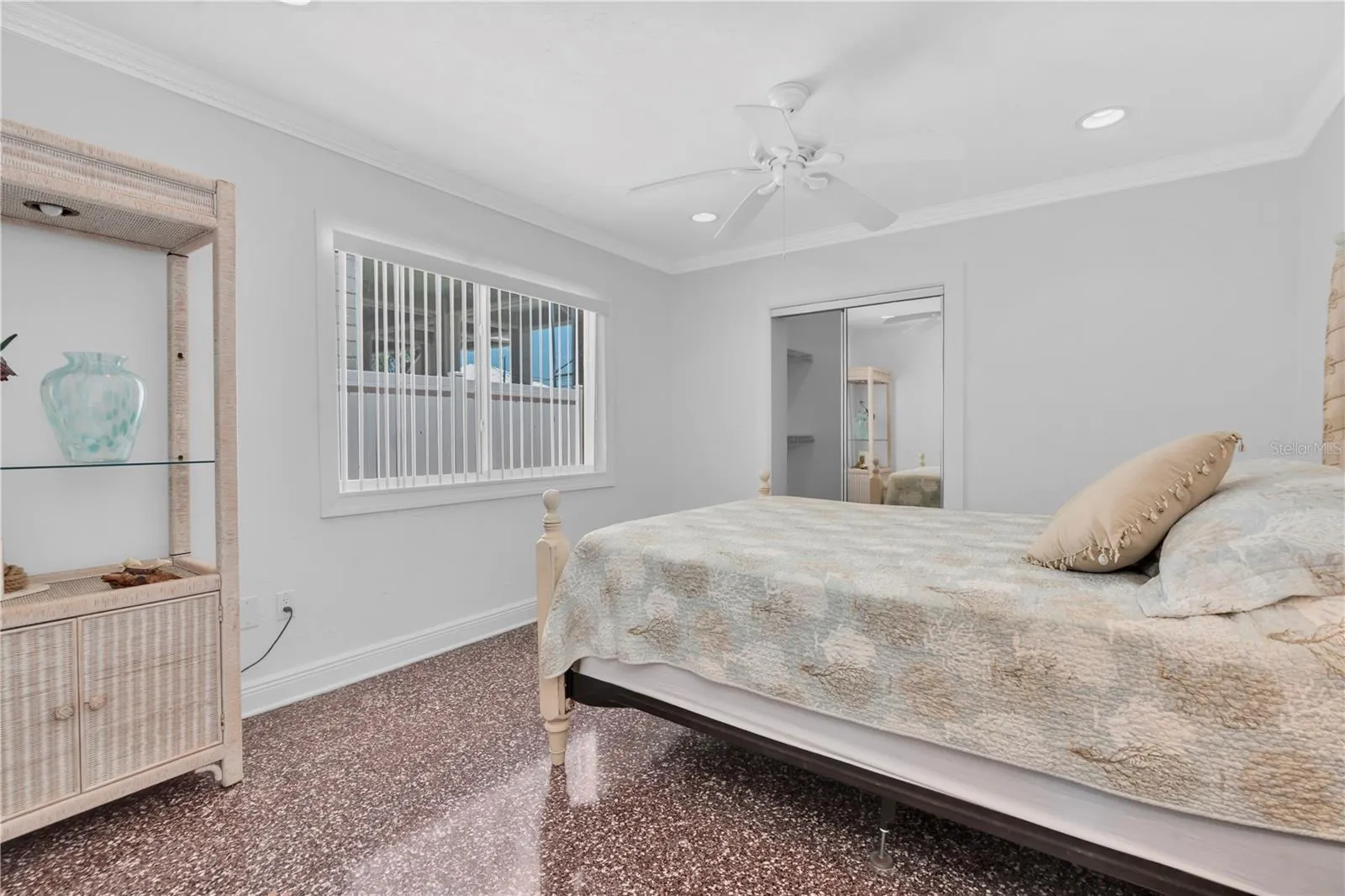 Bedroom with walk-in closet