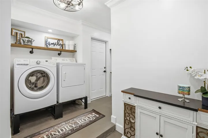 Laundry room with man-door to outside