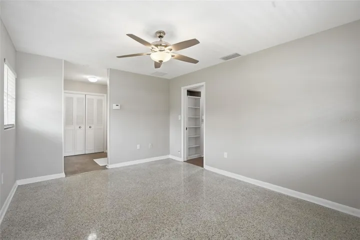 Terrazzo flooring in neutral tones of grey & beige