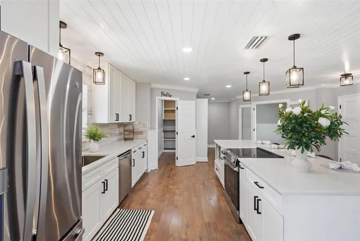 Shaker cabinetry and Quartz countertops