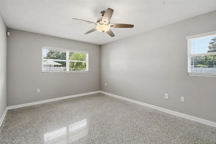 Primary bedroom is in the back of the home