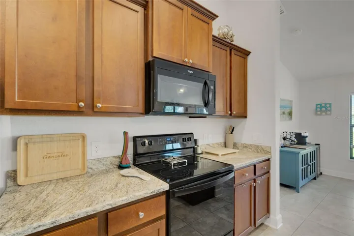 Wood cabinets and all kitchen appliances are included.