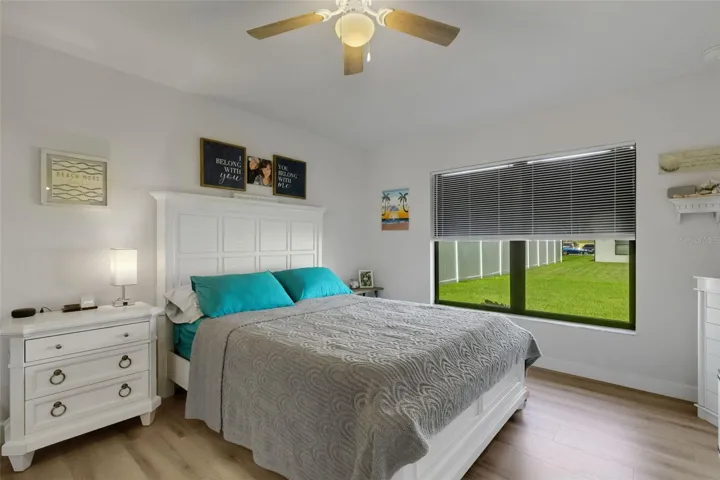 It too has a large picture window overlooking the lush green backyard . . .