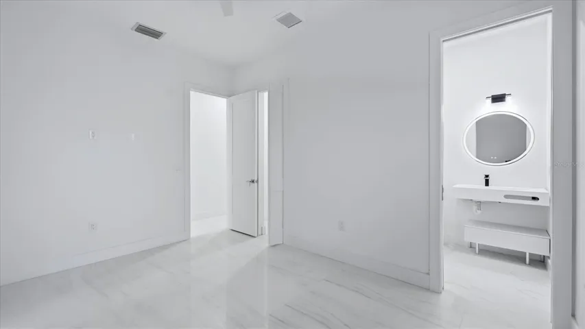 4th bedroom with attached bath and pool access