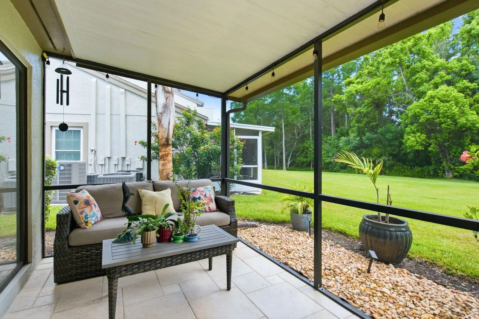 well sized screened in patio with privacy