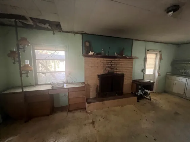 Garage With Fireplace
