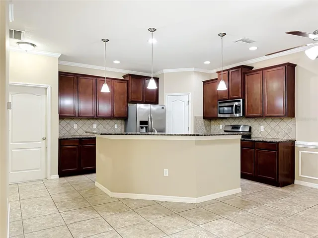 Kitchen features breakfast bar