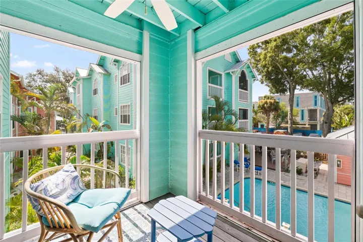 screened in Balcony overlooking pool