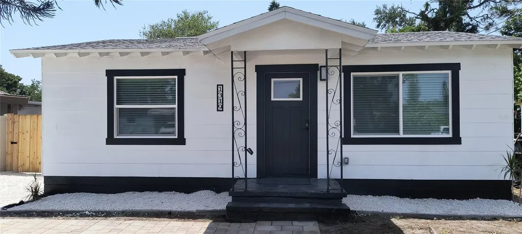 Front of home with covered entry