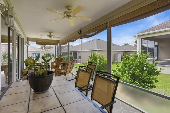 Screen enclosed lanai extends to almost the length of the back of the home.