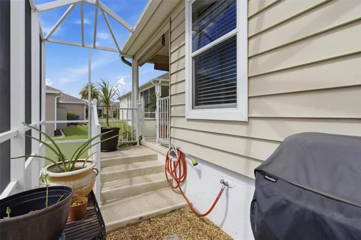 Side screened patio previously used as a dog run but could be great for a gardener.